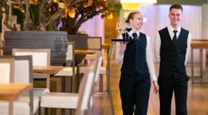 Working as a waiter or waitress